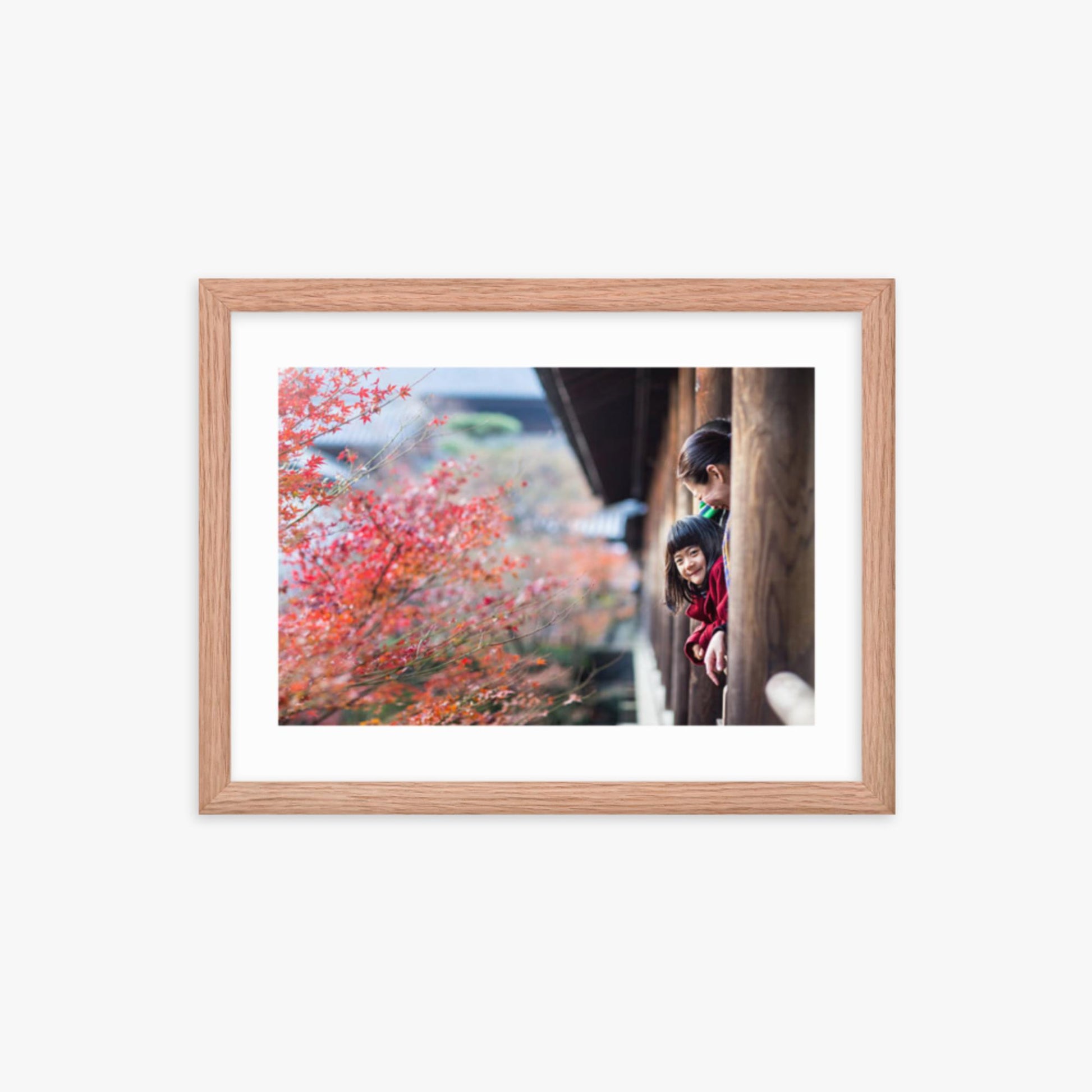 Father, mother and daughter at a temple enjoying autumn leaves 12x16 in Poster With Oak Frame