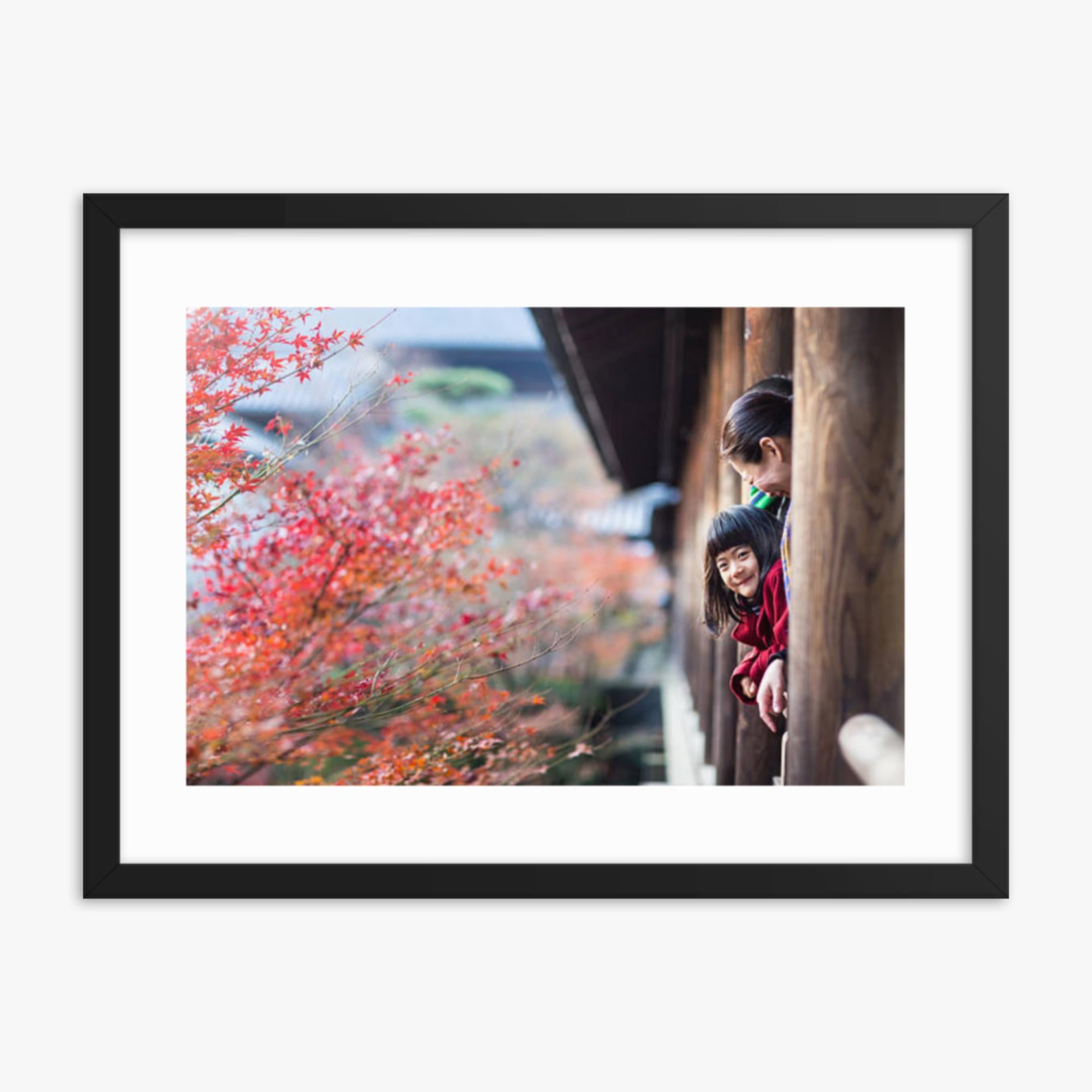 Father, mother and daughter at a temple enjoying autumn leaves 18x24 in Poster With Black Frame