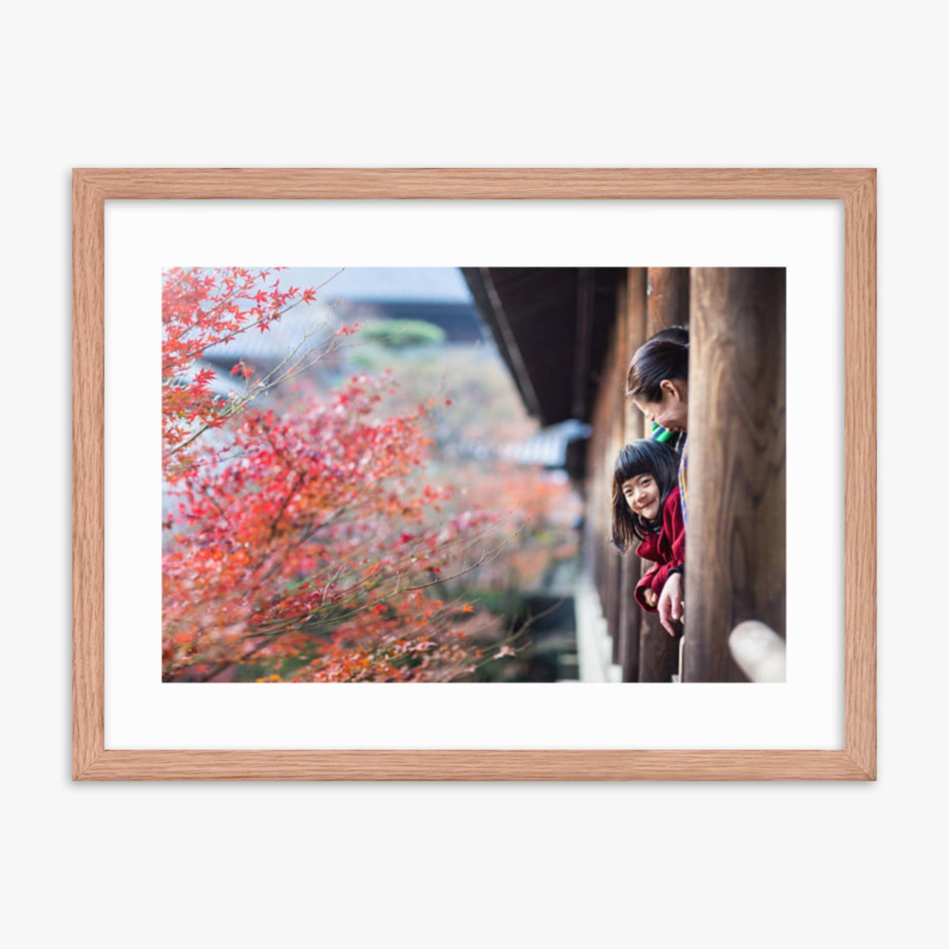 Father, mother and daughter at a temple enjoying autumn leaves 18x24 in Poster With Oak Frame