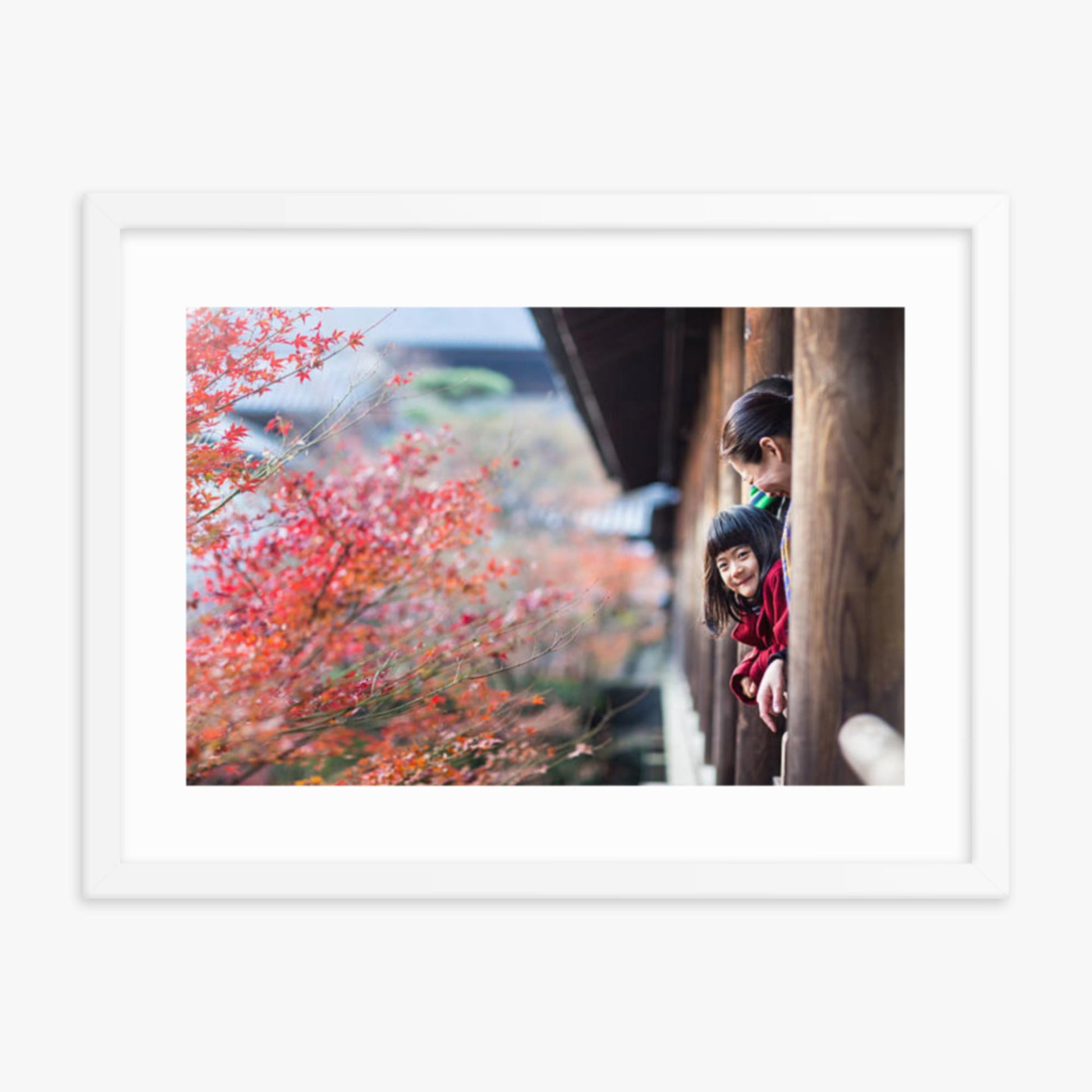 Father, mother and daughter at a temple enjoying autumn leaves 18x24 in Poster With White Frame