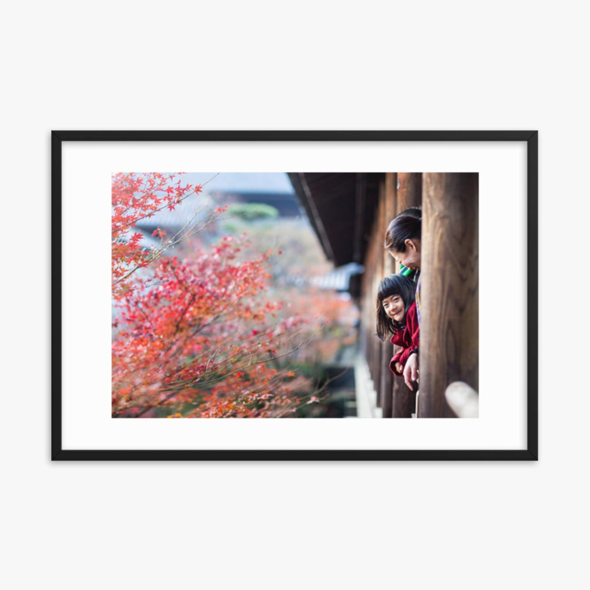 Father, mother and daughter at a temple enjoying autumn leaves 24x36 in Poster With Black Frame
