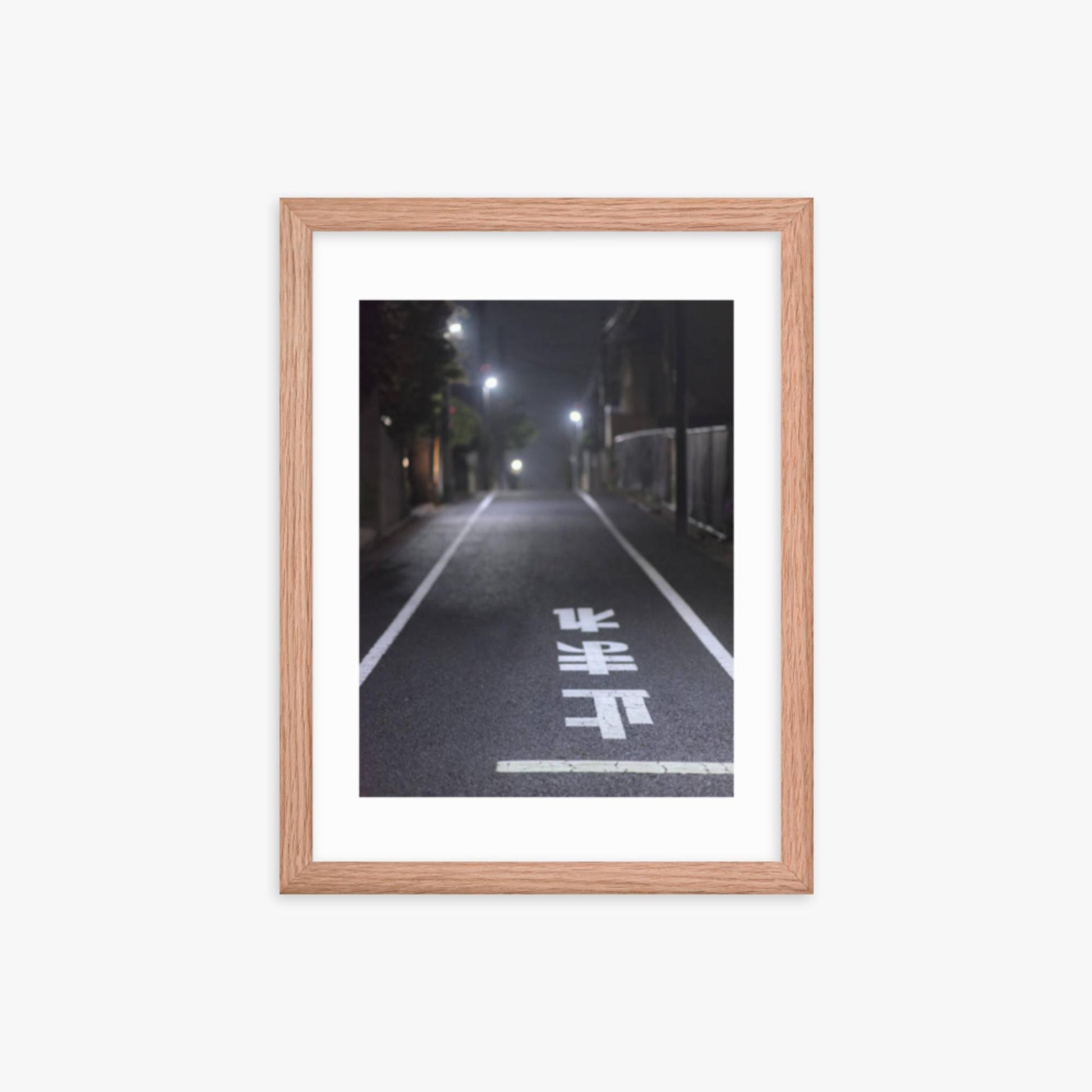 Typical road by night with the stop sign in Japanese written on the ground 12x16 in Poster With Oak Frame