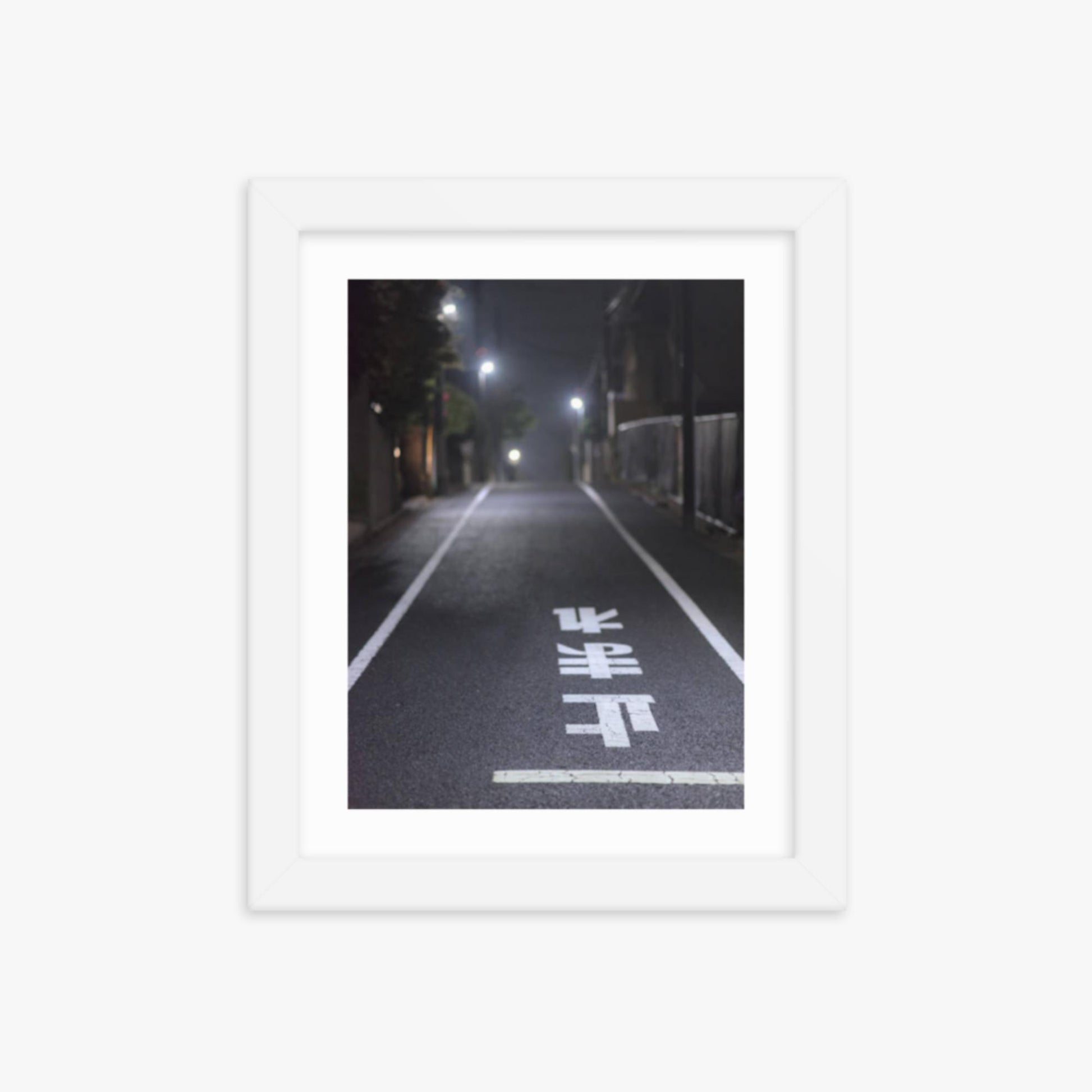 Typical road by night with the stop sign in Japanese written on the ground 8x10 in Poster With White Frame